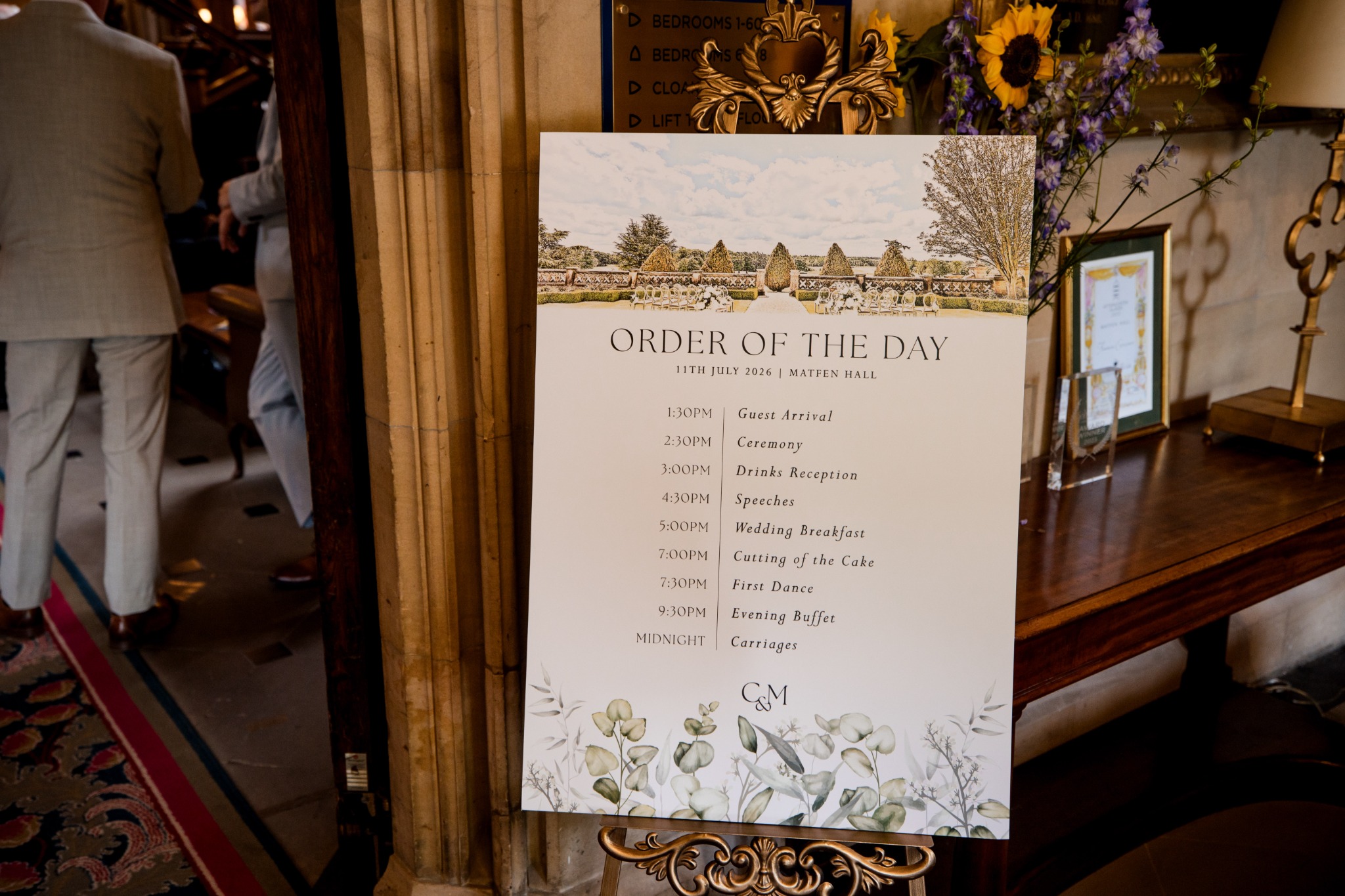 Wedding order of the day displayed in a gilded frame