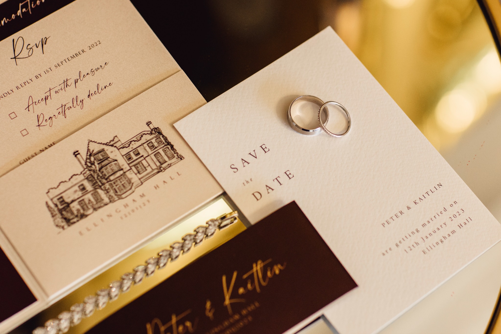 Bespoke save the date and invitation details for an Ellingham Hall wedding